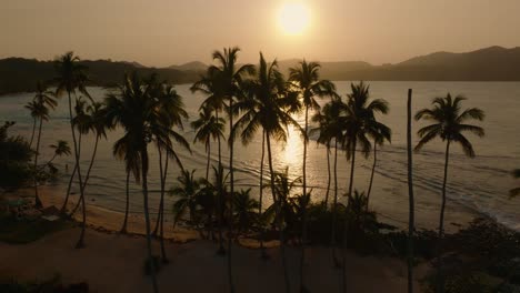 Dramatic-Sunset-Sky-Illuminated-Tropical-Resort-Of-La-Playita-Beach-In-Las-Galeras,-Samana,-Dominican-Republic