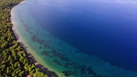 Aerial-view-of-sunny-mediterranean-seascape-and-coastline-at-Reşadiye-peninsula-in-Turkey,-Gereme-beach