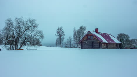Wooden-barn-in-the-winter-in-panorama-snowfield,-timelapse-day-to-night