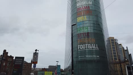 Manchester-Football-museum-in-Manchester-and-Urbis-Building,-England,-UK