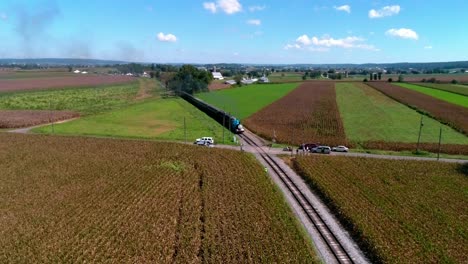 Thomas-the-Train-with-Passenger-Cars-Puffing-along-Amish-Countryside