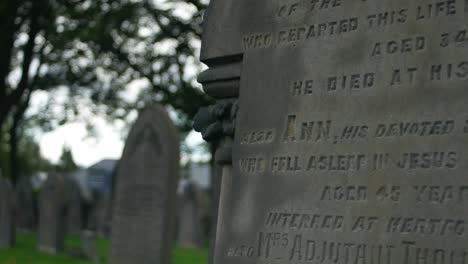 Downward-panning-shot-of-gravestone