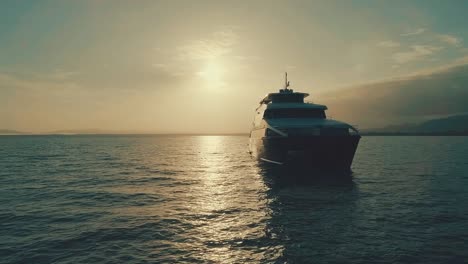 Drone-footage-during-sunrise-from-an-elegant-boat-near-the-coast