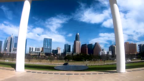 The-Austin-Skyline-from-the-Long-Center,-a-beautifully-framed-with-the-oval-bridge-that-used-to-be-the-circumference-for-the-old-Palmer-Event-Center