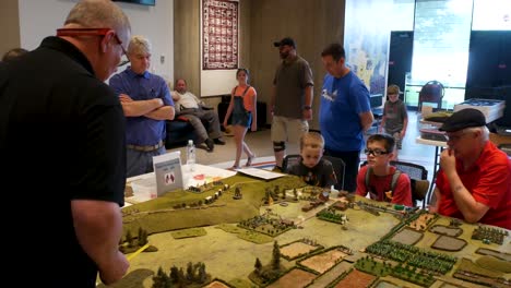 Adults-teach-young-people-how-to-play-tactical-civil-war-gaming