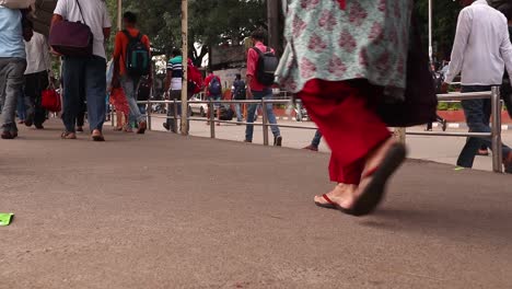 Closeup-shot-Footsteps-of-people,-Coming-out-from-the-railway's-station-with-backpacks