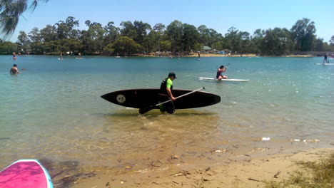 Man-attempts-Paddle-boarding-for-the-first-time-with-success