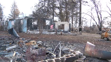 Camp-Fire-Destruction-Pan-of-Burnt-Car-and-House