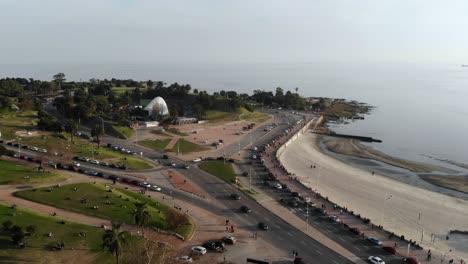 Landscape-drone-aerial-footage-of-traffic-in-the-coast-located-in-montevideo-Uruguay