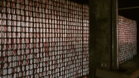 Stacks-of-Yuengling-Lager-beer-cans-awaiting-packaging-in-factory-at-Pottsville,-PA