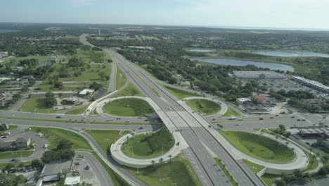 Cinematic-drone-clip-over-the-highway-27-and-state-road-50-interchange