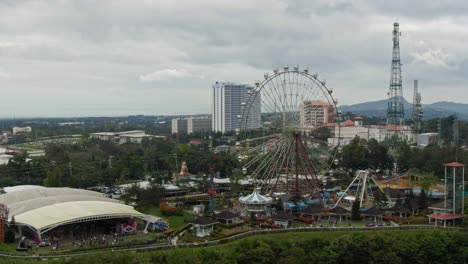 Aerial-view-of-Sky-Ranch-Theme-Park-on-the-top-of-the-mountain-from-Tagaytay-City,-Philippines