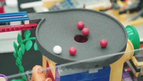 LEGO-build-of-funnel-where-balls-falling-through-in-the-middle-|-SLOWMOTION