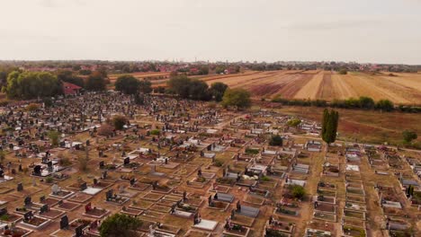 Aerial-drone-footage-of-the-cemetery-by-the-village