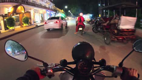 Hyperlapse-of-a-Tuk-Tuk-Driver-driving-in-the-Street-at-Night-Time