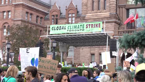 Crowds-protesting-climate-change-Queens-Park