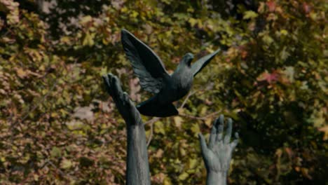 Prague-October-13-of-2019---Alegorie-Miru-statue-in-Prague-on-windy-day