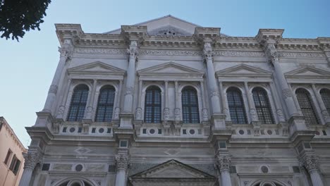 Exterior-of-the-Scuola-Grande-di-San-Rocco,-Ornate-art-museum,-Venice,-Italy