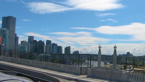 Driving-on-panoramic-bus-on-the-bridge-with-a-view-on-whole-Seattle