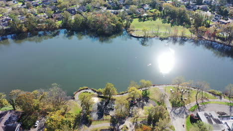 An-aerial-view-of-Grant-Pond-in-a-Long-Island,-NY-suburb