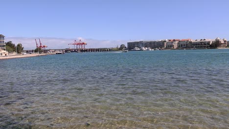 Swan-River-Perth-Australia,-view-of-calm-water-and-Fremantle-cranes