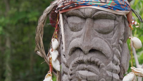 Slow-pedestal-shot-up-traditional-wooden-Kanak-sculpture-on-Isle-of-Pines