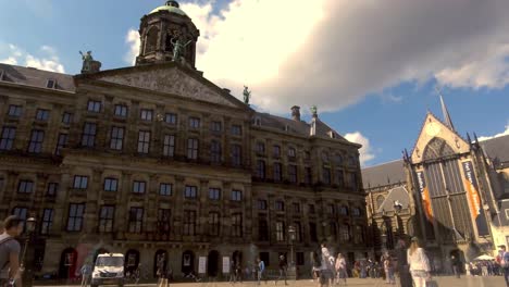People-and-tourist-at-Koninklijk-Paleis,-Royal-Palace-of-Amsterdam-,-Netherlands