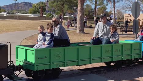 The-15-in-gauge-train-passes-in-front-of-the-camera,-McCormick-Stillman-Railroad-Park-Scottsdale,-Arizona