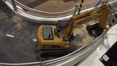 Toy-collection-of-the-construction-site-movement-with-excavators-and-crane-operated-by-remote-control