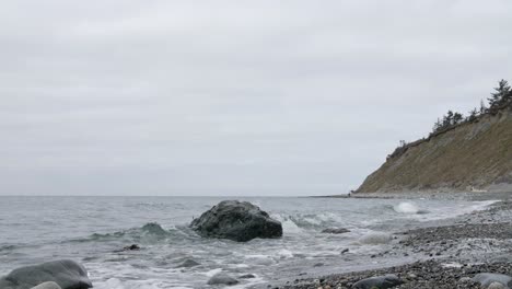 Waves-from-the-Puget-Sound-lapping-up-onto-the-shore-at-Ebey's-Landing