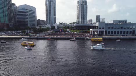 4K-aerial-video-tilt-up-reveal-over-the-4th-of-July-boat-parade-on-the-Garrison-Channel