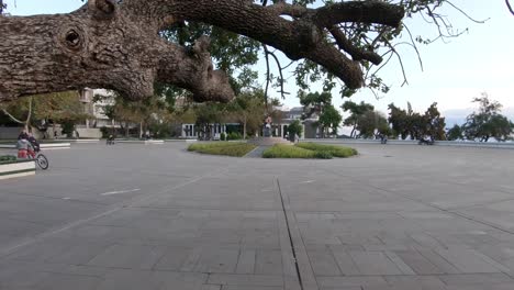 Reveal-shot-of-public-square-and-park-in-Antalya,-Turkey