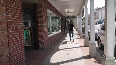 Elder-man-walking-at-Main-Street-Kingston,-NY