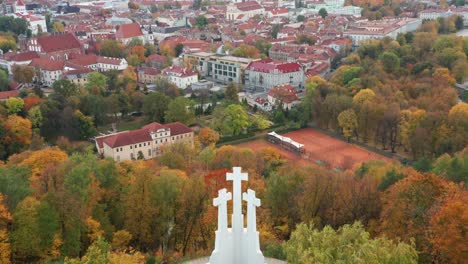 AERIAL:-The-Hill-of-Three-Crosses-with-Vilnius-City-Old-Town-in-Autumn