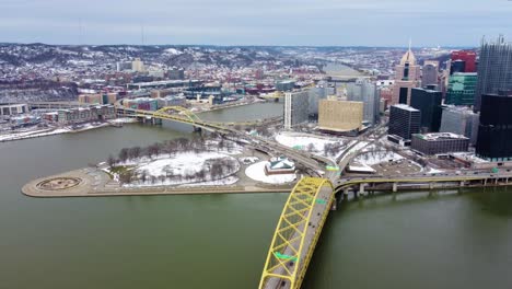 Tilt-up-reveal-Aerial-View-of-Pittsburgh-Skyline-downtown