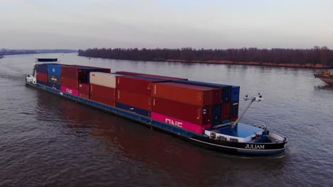 Aerial-View-Of-Stacked-Containers-On-Juliam-Cargo-Ship-Along-Oude-Maas