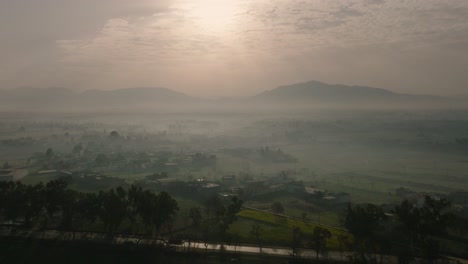 Aerial-View-Across-Rural-Misty-Landscape-In-Abbottabad-In-Pakistan