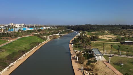 Hadera-Park-flying-over-river-and-modern-bridge