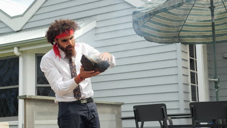 Australian-Aboriginal-Man-Performs-Traditional-Smoking-Ceremony