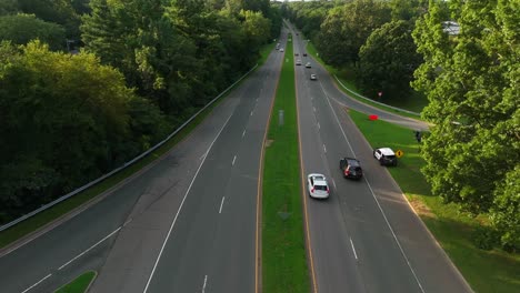 Police-cruiser-car-along-highway-uses-radar-gun-to-check-speeding