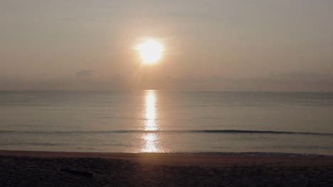Sunrise-over-calm-ocean-in-western-Malaysia
