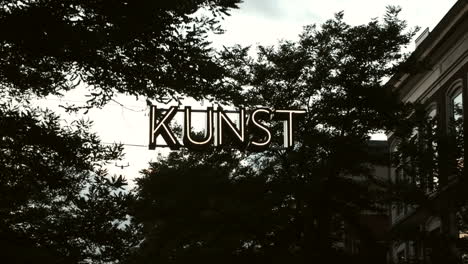 neon-art-sign-"Kunst"-hanging-across-the-street