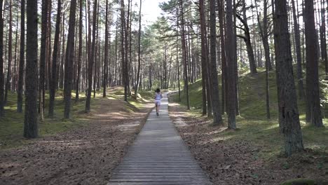 Girl-likes-running-in-the-forest