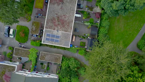 Drone-flying-up-from-a-house-with-Solar-Panels