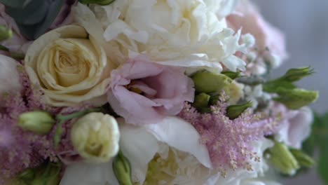 Extreme-closeup-slider-shot-of-a-beautiful-wedding-bride-bouquet-flowers