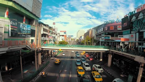 People-walking-on-the-birdge-on-the-victory-monument-in-Bangkok