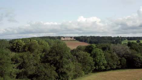Aerial-Reveal-of-Harewood-House,-a-Country-House-in-West-Yorkshire