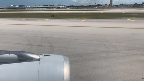 Taking-off-with-another-aircraft-landing-at-Miami-International-Airport