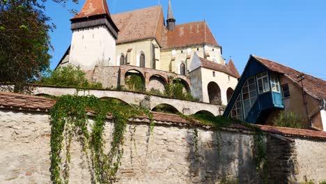 Tilt-up-shot-of-the-Biertan-fortified-church,-Unesco-World-Heritage,-on-a-bright-summer-day