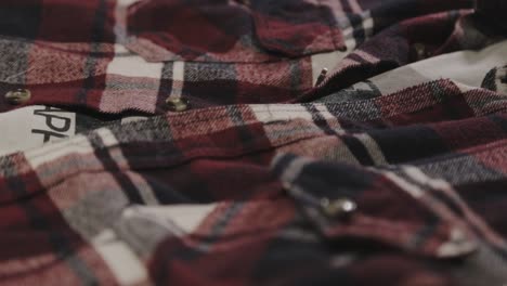 Closeup-Scenery-Of-A-Red-Striped-Knit-Long-Sleeve-Polo-Shirt---Closeup-Shot